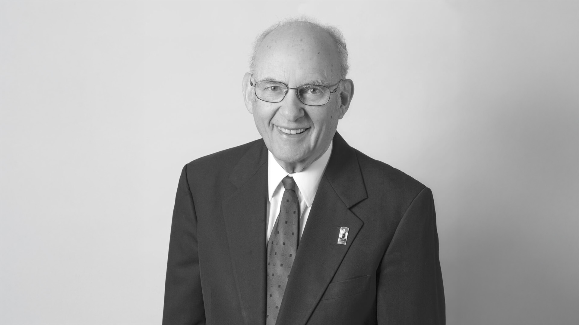 a black and white image of 73 year old man