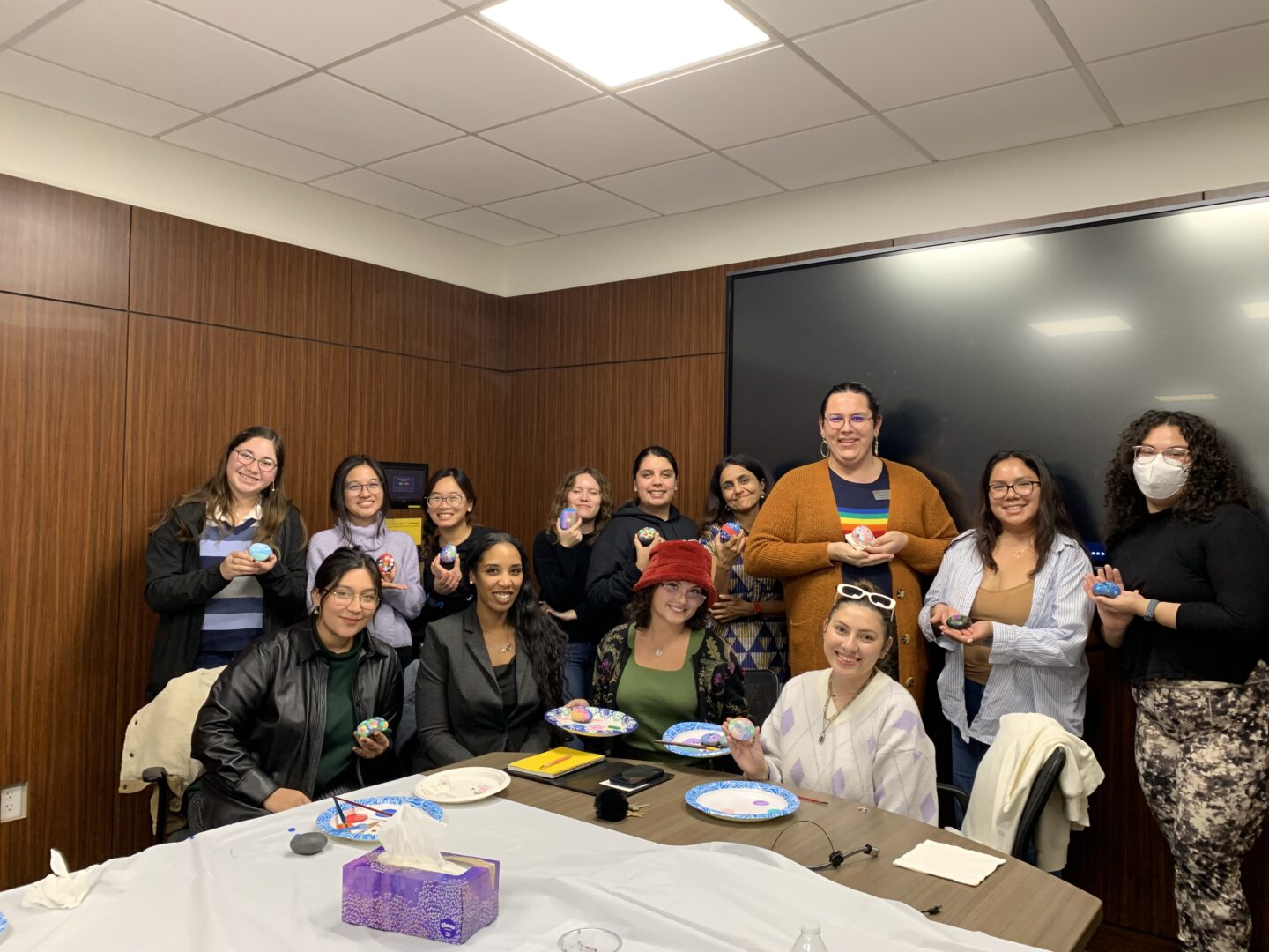 Daniela Narvaez, seated in the middle with red hat, is hosting a support group for women in STEM majors in hopes of increasing graduation and retention rates.