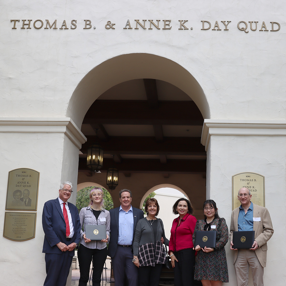 Dean Jeffrey Roberts, Ky Putnam, Tim & Krista Day, President de la Torre, Trang Tran, and Ken Nollett in Thomas B. & Anne K. Day Quad.