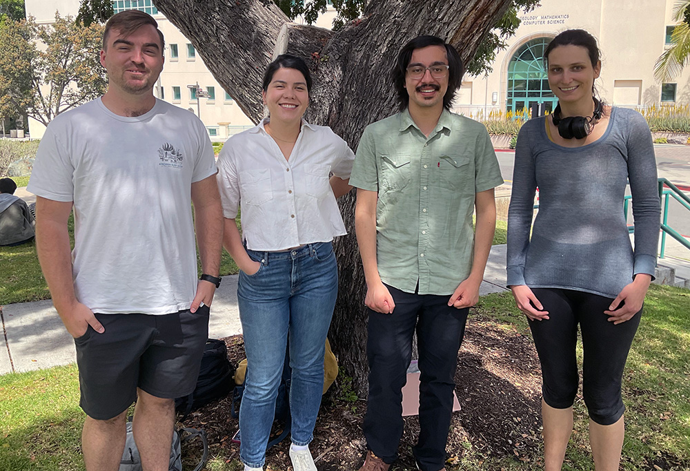 Kris McBrian, Mandy Bowman, Antonio Cobarrubia, and Sasha Curcic ouside under a tree.