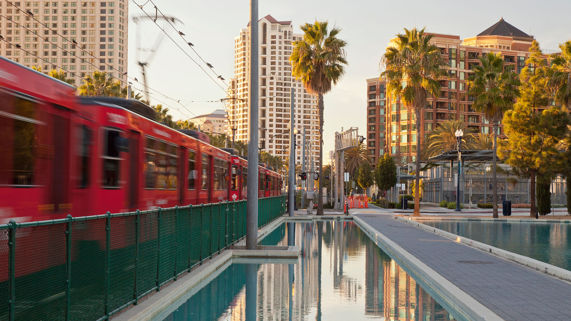 San Diego train whizzing through the Children's Park in Martin Luther King Jr. Promenade.