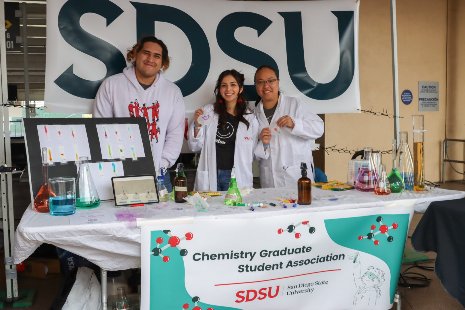 The Chemistry Graduate Student Association demonstrating science experiments at the 2023 San Diego Festival of Science and Engineering