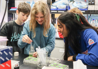 Tracy Beach’s students have a blast working with SDSU researcher Shaila Prasad to pipette samples