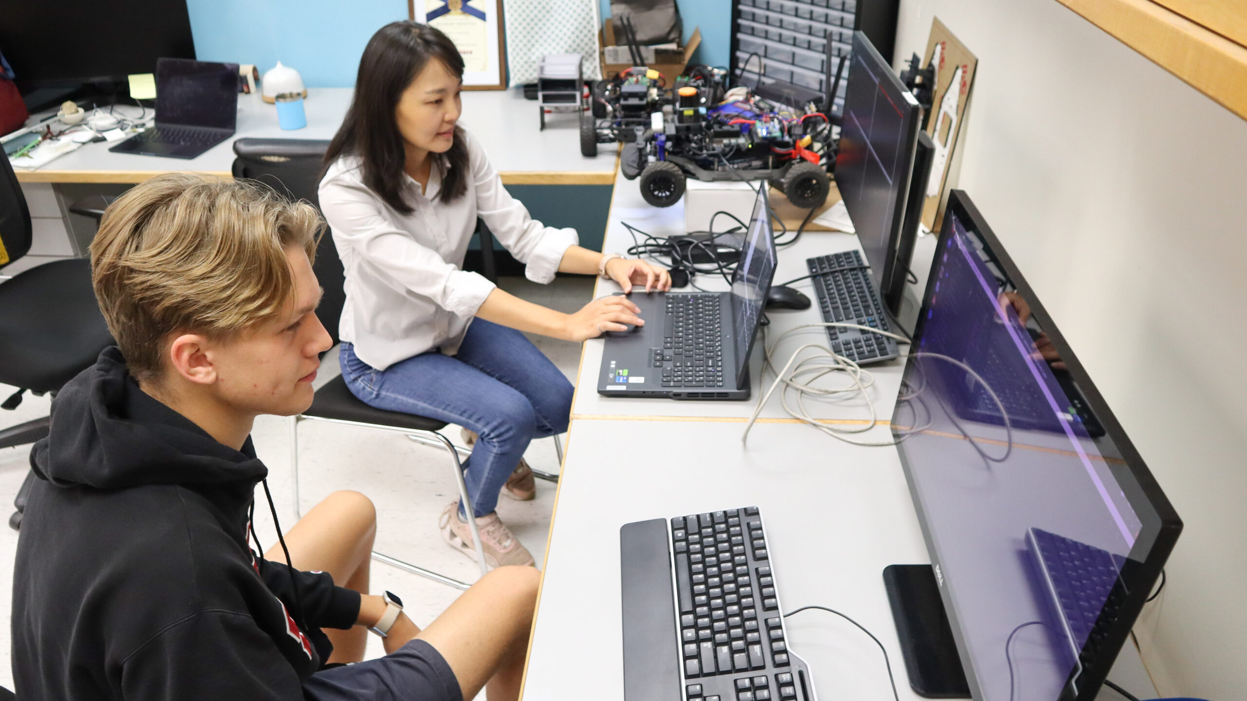 Fourth-year computer science student Pascal Reich and master’s student Hyunhee Kwak develop software and advanced algorithms, implementing modeling and analysis techniques for a project to develop a self-driving vehicle in computer science Assistant Professor Hyunjong Choi’s lab